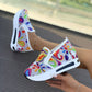 Blommigt mönstrade sneakers i broderad mesh