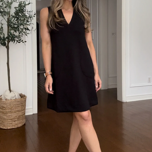 Kvinnors elegant ärmlös klänning med V-ringning