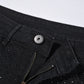Smalpassade svarta jeans med strassdekorationer
