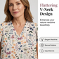 Blommig damblus med V-ringning och knappar framtill