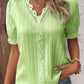 Elegant blus med solid spets och V-hals
