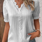 Elegant blus med solid spets och V-hals