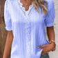 Elegant blus med solid spets och V-hals
